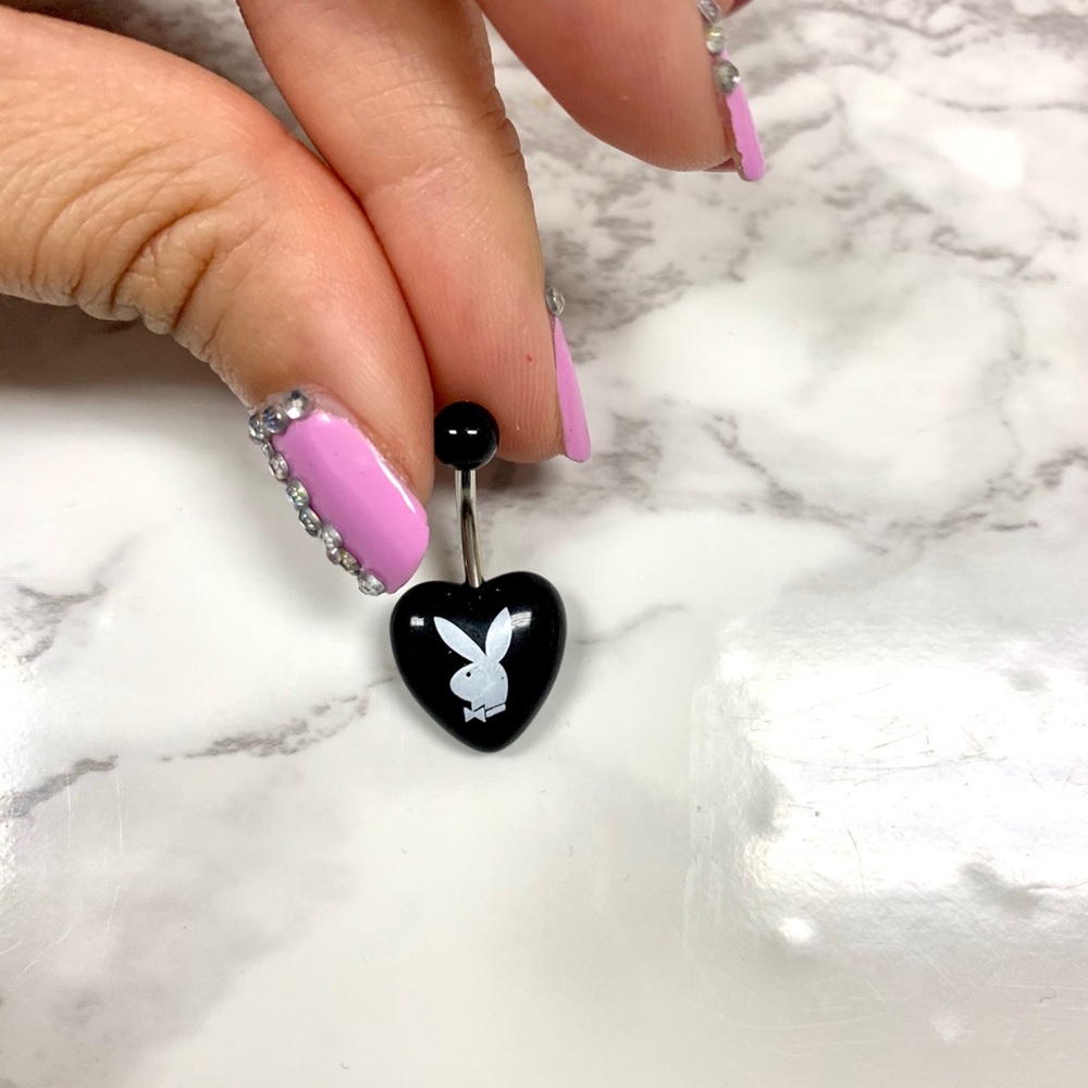 Playboy belly ring